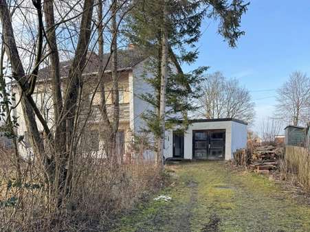 Ansicht mit Garage - Einfamilienhaus in 86899 Landsberg mit 134m² kaufen