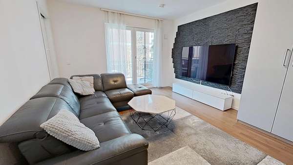 Wohnzimmer 2 - Etagenwohnung in 80999 München mit 46m² kaufen