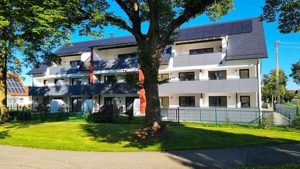 Außenfoto 2 - Erdgeschosswohnung in 86836 Obermeitingen mit 58m² kaufen