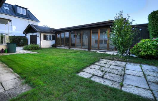 Sicht Wintergarten - Einfamilienhaus in 82008 Unterhaching mit 125m² kaufen