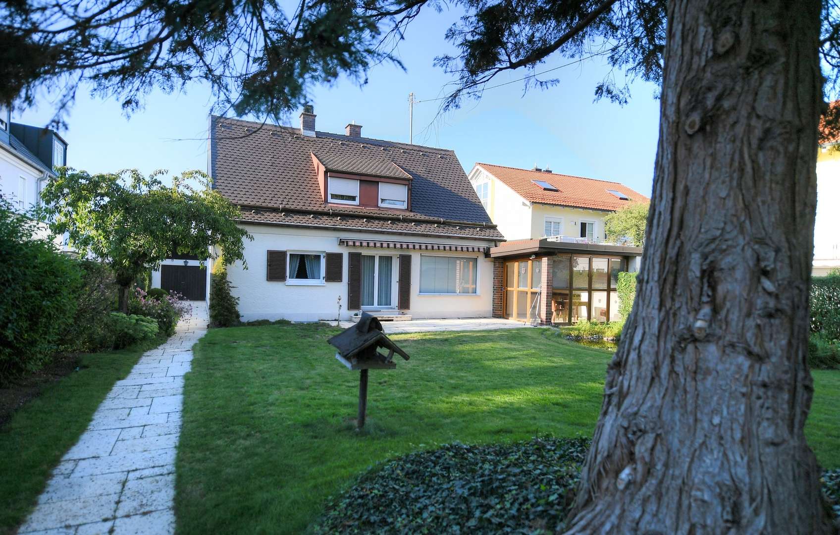 Titelbild - Einfamilienhaus in 82008 Unterhaching mit 125m² kaufen