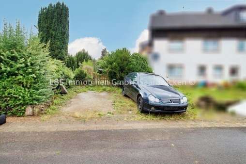 2 Stellplätze gegenüber - Reihenmittelhaus in 66839 Schmelz mit 130m² kaufen
