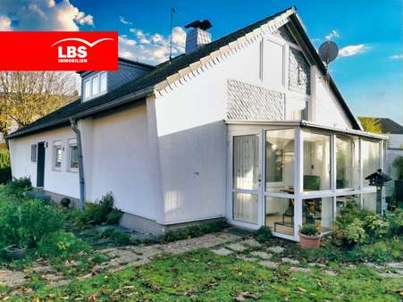 Seitenansicht - Einfamilienhaus in 50997 Köln mit 166m² kaufen