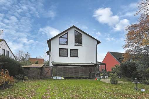 Ansicht aus dem Garten - Mehrfamilienhaus in 28717 Bremen mit 249m² kaufen