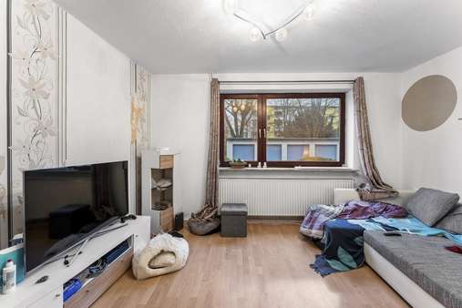 Wohnzimmer - Reihenmittelhaus in 28217 Bremen mit 120m² kaufen