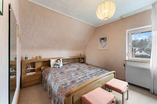 Schlafzimmer - Einfamilienhaus in 28777 Bremen mit 76m² kaufen