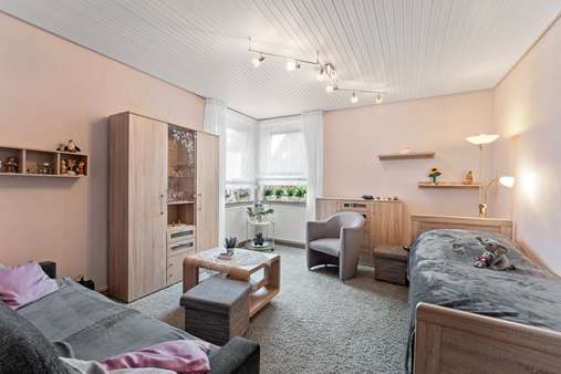 Wohnzimmer - Einfamilienhaus in 28777 Bremen mit 76m² kaufen