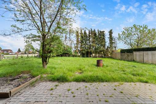Blick auf den rückwärtigen Garten - Einfamilienhaus in 27711 Osterholz-Scharmbeck mit 142m² kaufen