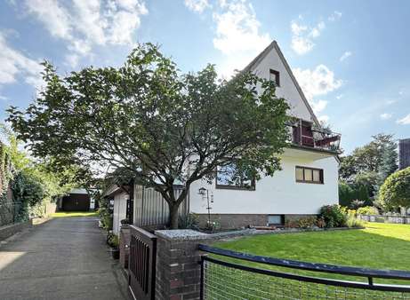 Seitenansicht - Zweifamilienhaus in 28717 Bremen mit 200m² kaufen