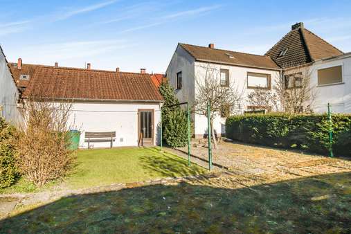 Rückansicht Rückansicht - Einfamilienhaus in 28755 Bremen mit 200m² kaufen