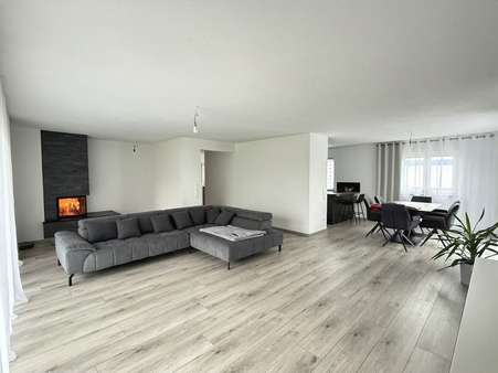 Wohn- und Essbereich mit Kamin Wohn- und Essbereich mit Kamin - Bungalow in 88605 Sauldorf mit 145m² kaufen