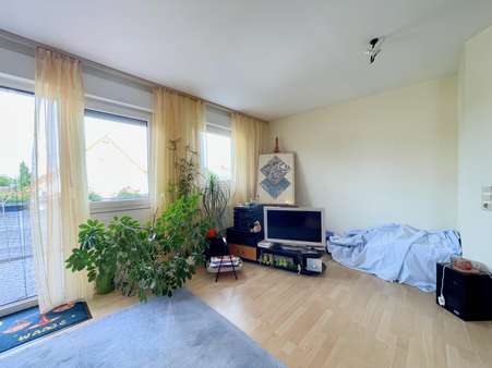 Wohnbereich - Dachgeschosswohnung in 63165 Mühlheim mit 69m² kaufen