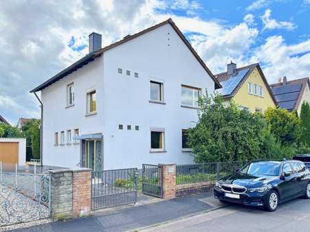 Außenansicht Außenansicht - Einfamilienhaus in 63456 Hanau mit 116m² kaufen