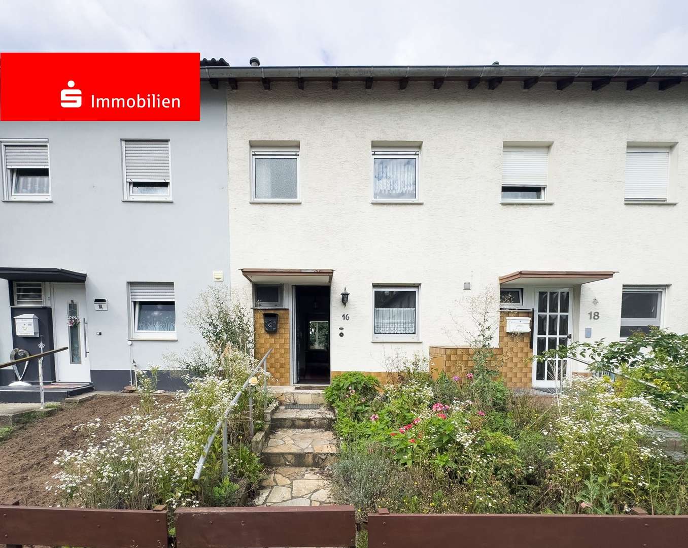 Hausansicht Hausansicht - Reihenmittelhaus in 63110 Rodgau mit 77m² kaufen