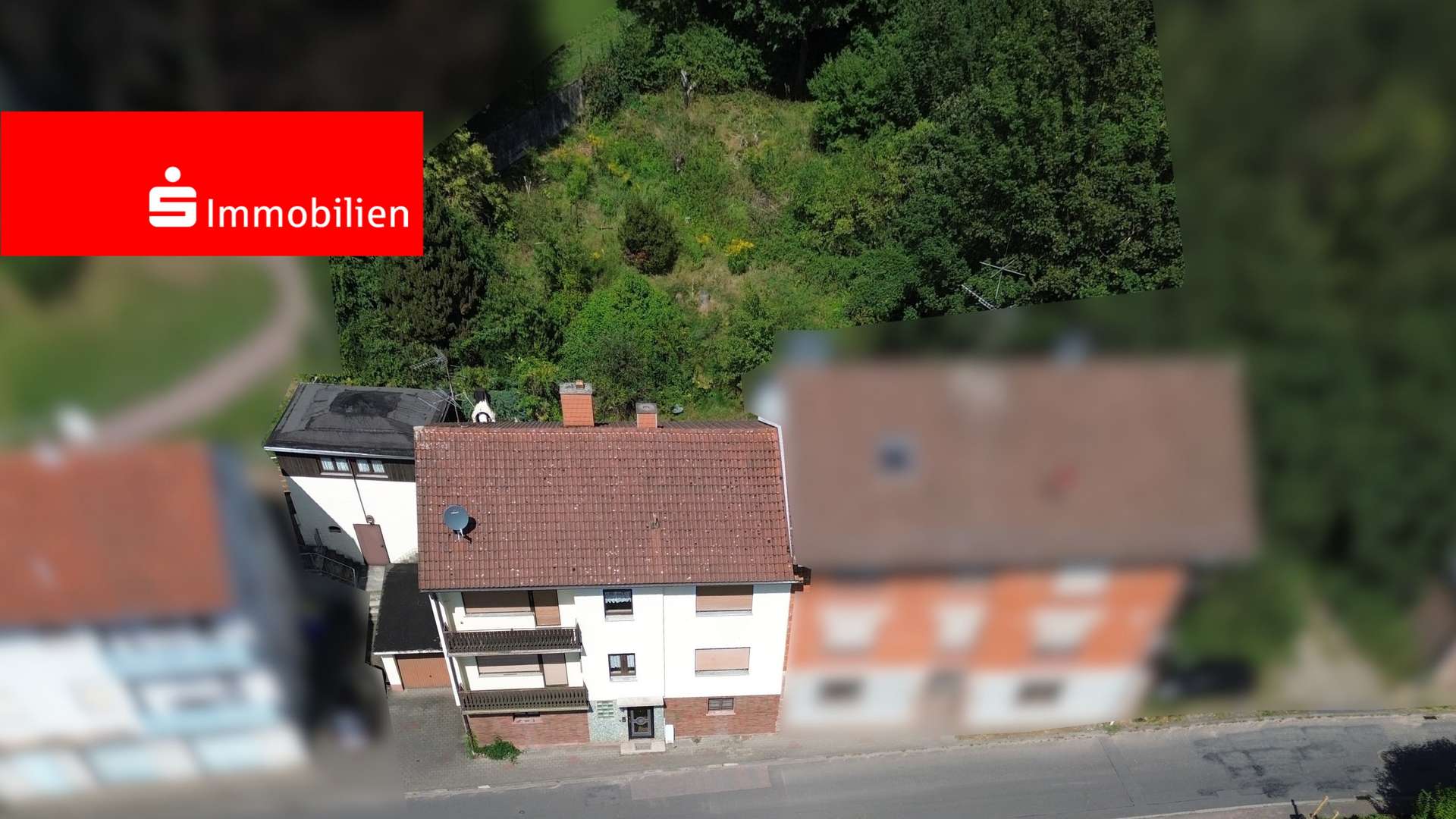 Drohnenaufnahme Strassenseite - Zweifamilienhaus in 63637 Jossgrund mit 173m² kaufen