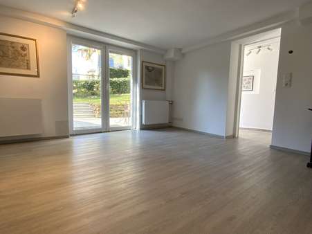 Wohnzimmer - Souterrain-Wohnung in 61348 Bad Homburg mit 51m² mieten