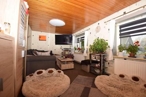 Wohnzimmer - Doppelhaushälfte in 25421 Pinneberg mit 150m² kaufen