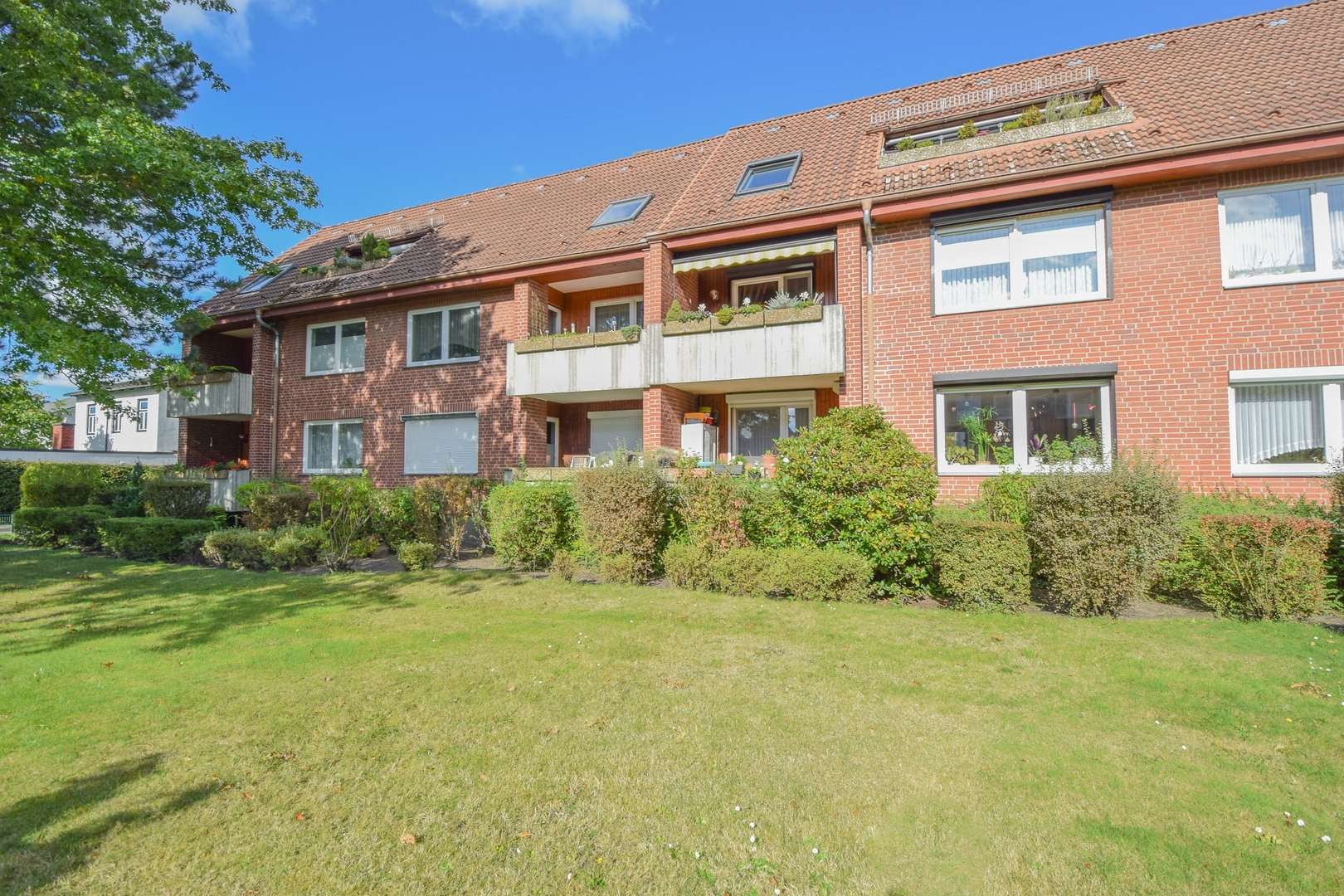 Rückansicht des Hauses. - Erdgeschosswohnung in 25337 Elmshorn mit 74m² kaufen