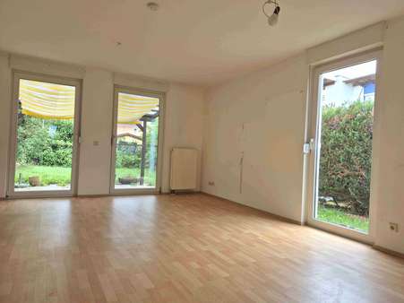Wohnzimmer - Reihenendhaus in 63165 Mühlheim mit 100m² kaufen