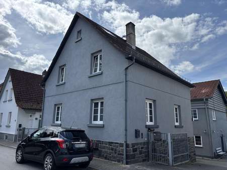 Straßenansicht - Einfamilienhaus in 64686 Lautertal mit 119m² kaufen