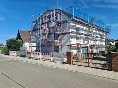 Hausansicht - Etagenwohnung in 68623 Lampertheim mit 92m² kaufen
