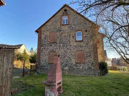 Seitenansicht Wohngebäude Seitenansicht Wohngebäude - Einfamilienhaus in 34621 Frielendorf mit 160m² kaufen