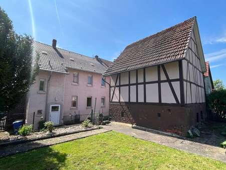 Rückansicht - Zweifamilienhaus in 34326 Morschen mit 152m² kaufen