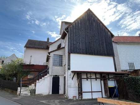 Seitenansicht - Doppelhaushälfte in 34587 Felsberg mit 67m² kaufen