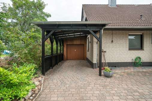 Carport - Zweifamilienhaus in 24628 Hartenholm mit 269m² kaufen