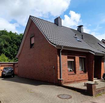 Seitenansicht Seitenansicht - Doppelhaushälfte in 25566 Lägerdorf mit 80m² kaufen