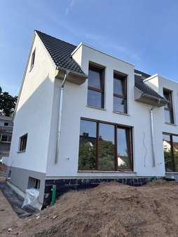 Ansicht Südseite Ansicht Südseite - Reihenendhaus in 63477 Maintal mit 107m² kaufen