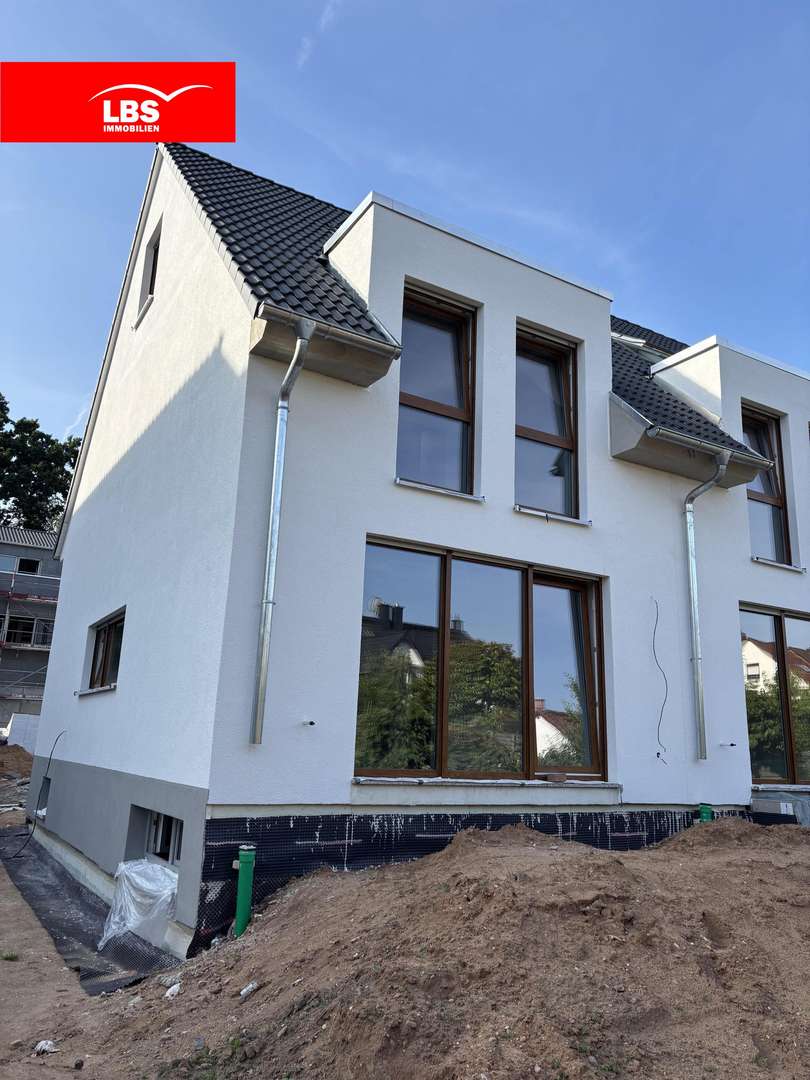 Ansicht Südseite - Reihenendhaus in 63477 Maintal mit 107m² kaufen