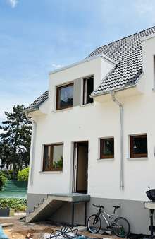Ansicht vorne - Reihenendhaus in 63477 Maintal mit 107m² kaufen
