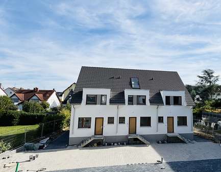 Vorderansicht - Reihenmittelhaus in 63477 Maintal mit 107m² kaufen