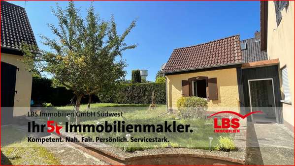 Rückansicht Rückansicht - Einfamilienhaus in 67363 Lustadt mit 180m² kaufen