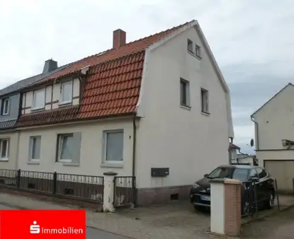 Doppelhaushälfte und Einfamilienhaus 