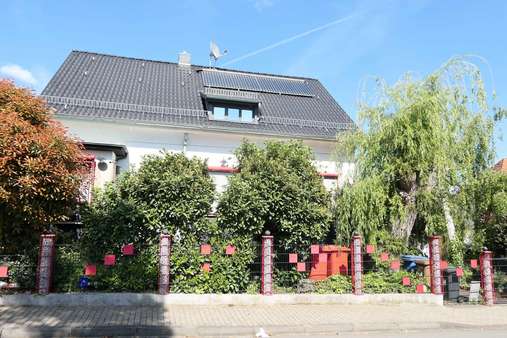 Seitenansicht  - Einfamilienhaus in 65439 Flörsheim mit 156m² kaufen