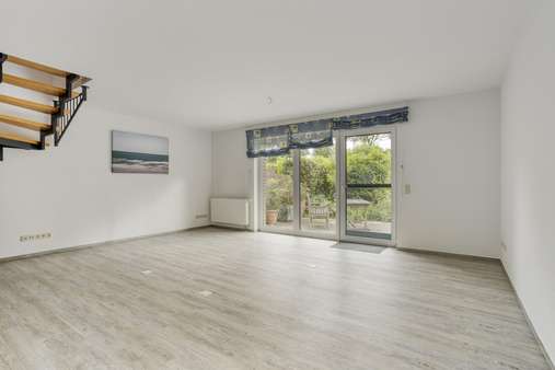 Wohnzimmer - Doppelhaushälfte in 47551 Bedburg-Hau mit 80m² kaufen