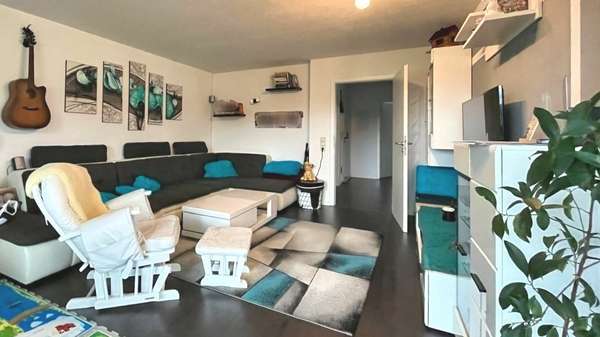 Wohnzimmer - Erdgeschosswohnung in 78658 Zimmern mit 81m² kaufen
