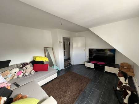 Wohnzimmer DG - Mehrfamilienhaus in 76437 Rastatt mit 189m² kaufen