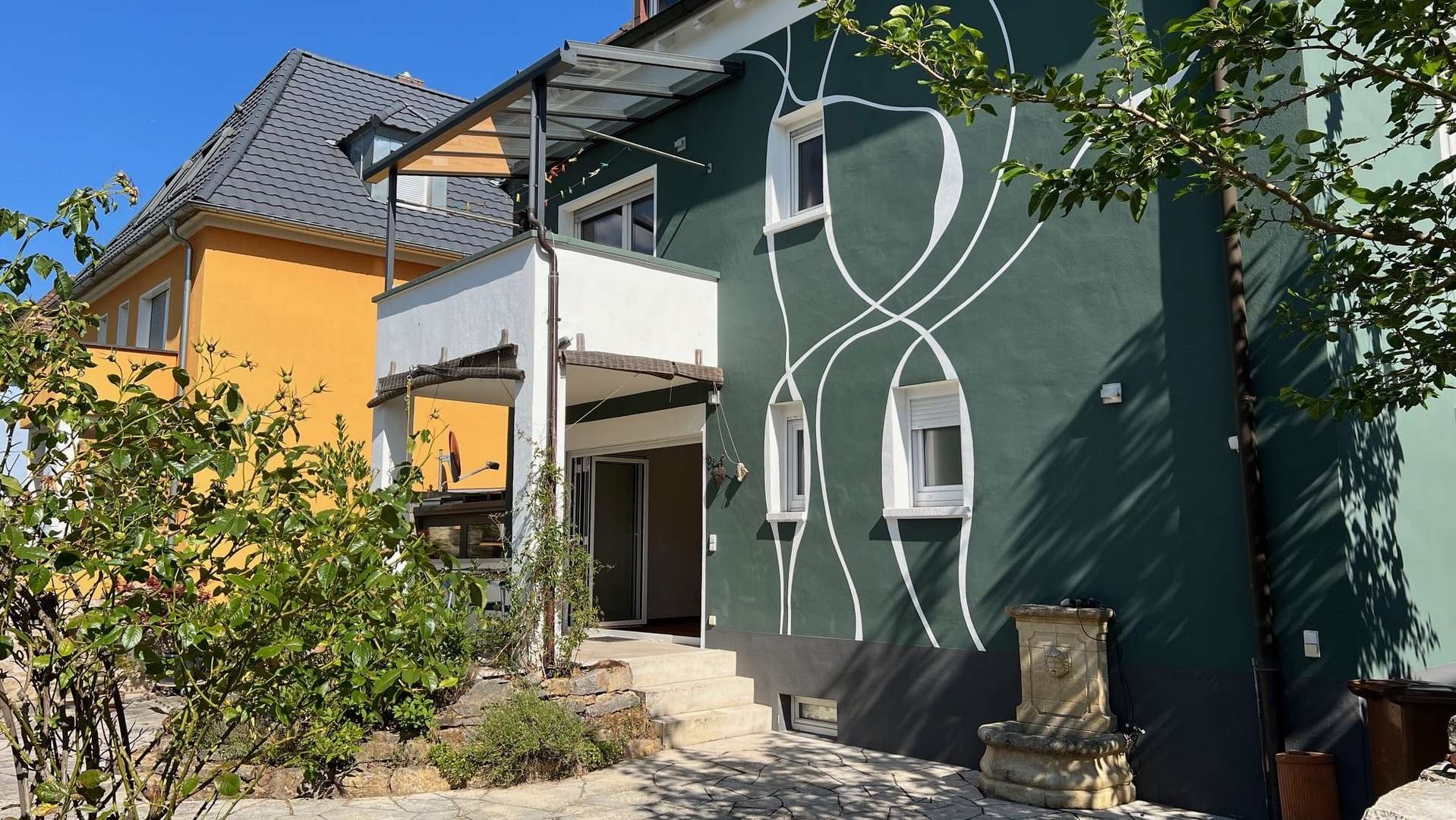 Hausansicht Garten - Einfamilienhaus in 68309 Mannheim mit 178m² kaufen
