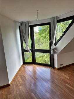 Wohnzimmer - Maisonette-Wohnung in 50859 Köln mit 69m² kaufen