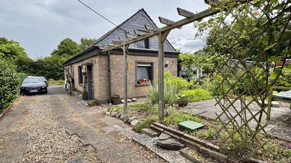 2 Außenansicht 2 Außenansicht - Doppelhaushälfte in 47665 Sonsbeck mit 38m² kaufen