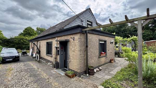 3 Außenansicht 3 Außenansicht - Doppelhaushälfte in 47665 Sonsbeck mit 38m² kaufen
