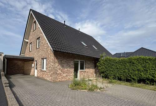 Außenansicht Außenansicht - Doppelhaushälfte in 49477 Ibbenbüren mit 109m² kaufen