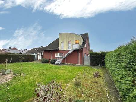 Gartenansicht - Zweifamilienhaus in 48485 Neuenkirchen mit 200m² kaufen