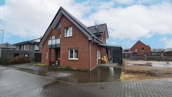Außenansicht - Zweifamilienhaus in 48485 Neuenkirchen mit 181m² günstig kaufen