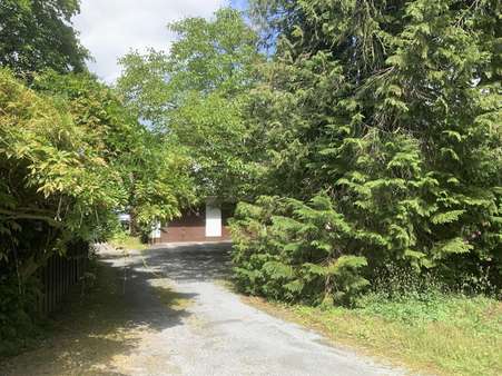 Zufahrt Nordseite - Einfamilienhaus in 59557 Lippstadt mit 161m² als Kapitalanlage kaufen