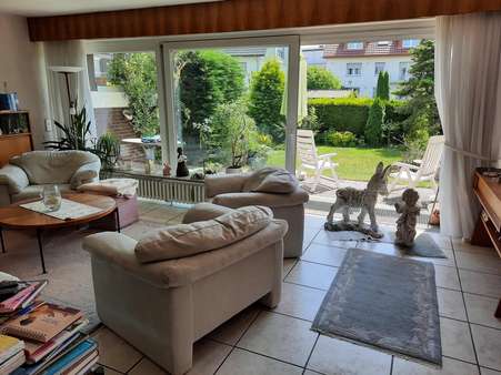 Wohnzimmer der Erdgeschosswohnung 2022 - Zweifamilienhaus in 59557 Lippstadt mit 188m² kaufen