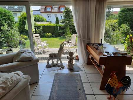 Wohnzimmer der Erdgeschosswohnung 2022 - Zweifamilienhaus in 59557 Lippstadt mit 188m² kaufen